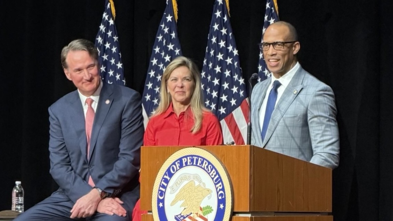 Secretary Turner behind a podium Secretary Turner behind a podium