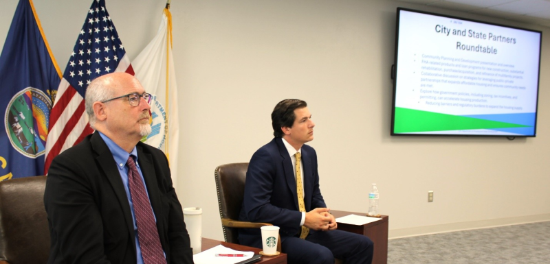 HUD Great Plains Regional Administrator Joe Mitchell and Deputy Regional Administrator Bruce Ladd engage with an audience of state and local housing development officials at the HUD Kansas City Regional Office. HUD Great Plains Regional Administrator Joe Mitchell and Deputy Regional Administrator Bruce Ladd engage with an audience of state and local housing development officials at the HUD Kansas City Regional Office.