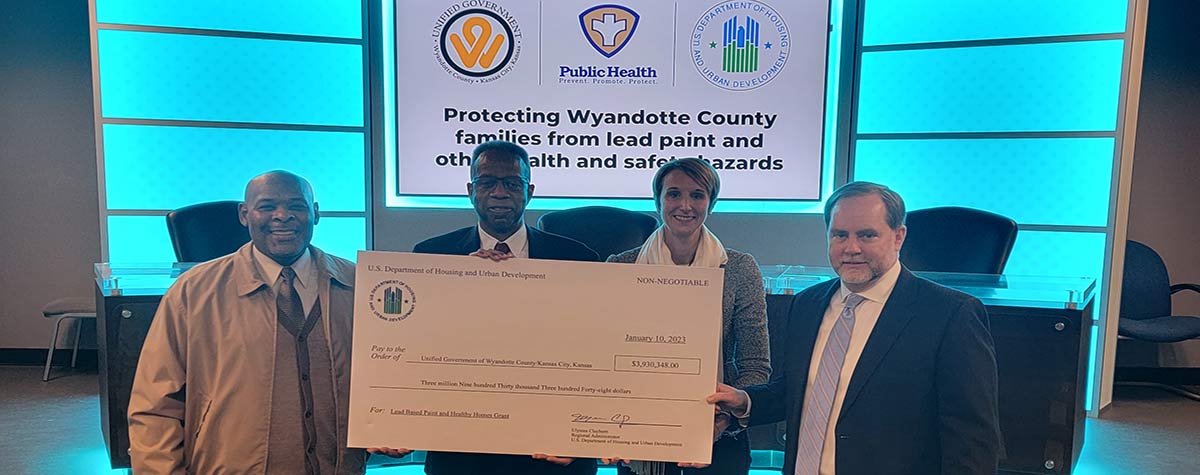 [(L-R) UG Mayor/CEO Tyrone Garner, HUD Great Plains Regional Administrator Ulysses Clayborn, UG Public Health Department Director Juliann Van Liew and UG Assistant County Administrator Alan Howze recognizing Wyandotte County's award of over $3.9 million in lead hazard and healthy homes funds from HUD.]