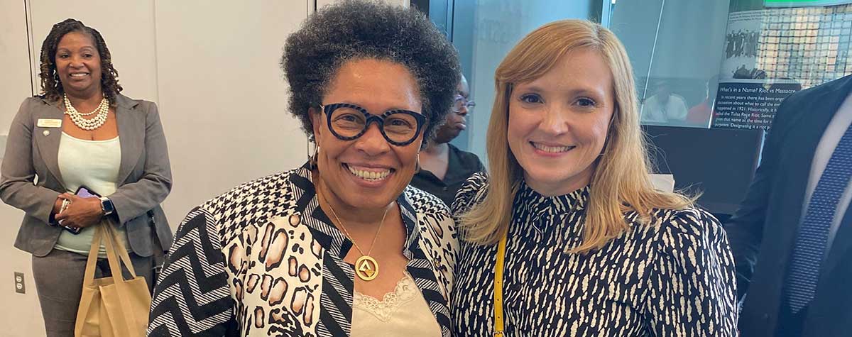 [(L-R) HUD Secretary Marcia Fudge with Presidential Management Fellow Megan Wheeler at the award presentation for a $50 million Choice Neighborhood Initiative grant to the Tulsa (Oklahoma) Housing Authority in September 2022.]