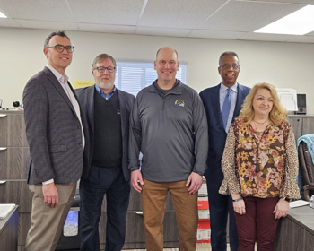 [(L-R) Matthew Segerdal HW Development; Steve Eggleston former HUD Iowa Field Office Director; David Fierke, Fort Dodge City Manager; Ulysses Clayborn, HUD Great Plains Regional Administrator; and Vickie Reeck, Fort Dodge Community & Economic Development Director]