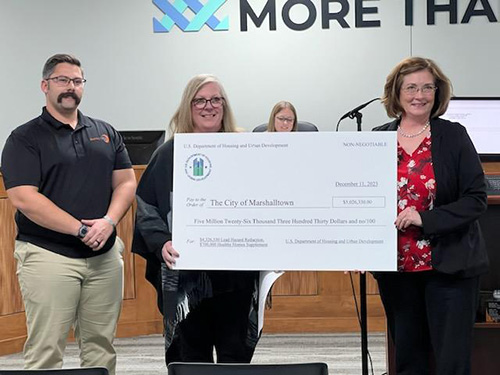 [L to R: Tyler Silverthorn, Project Manager, IMPACT7G; Jackie Pippin, Lead Grant Program Manager, City of Marshalltown; Julie Sleeper, State Director, HUD Iowa Field Office]