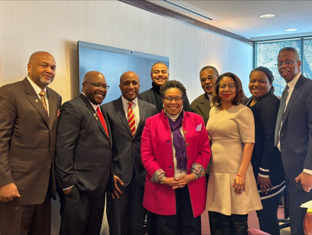 [(L-R) Terrell Walls, President, Greater Kansas City Association of Real Estate Brokers; Dr. John Young, Regional Support Specialist, HUD Great Plains; Kansas City Mayor Quinton Lucas; Emmett Pierson, President and CEO, Community Builders of Kansas City (center-rear); HUD Secretary Marcia Fudge (center-front); Rep. Emanuel Cleaver II (MO-5) (back-right); Kansas City 3rd District-at-large Councilwoman Melissa Patterson-Hazley; Kansas City 3rd District Councilwoman Melissa Robinson and HUD Great Plains Regional Administrator Ulysses Clayborn in Kansas City, Missouri on January 14, 2024 (Photo: HUD Press Office)]